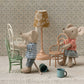 Two Maileg Vintage Chairs (Dark Powder) provide charming seating for toy mice or a unique dollhouse accent, complete with mugs and a lamp set against patterned wallpaper.