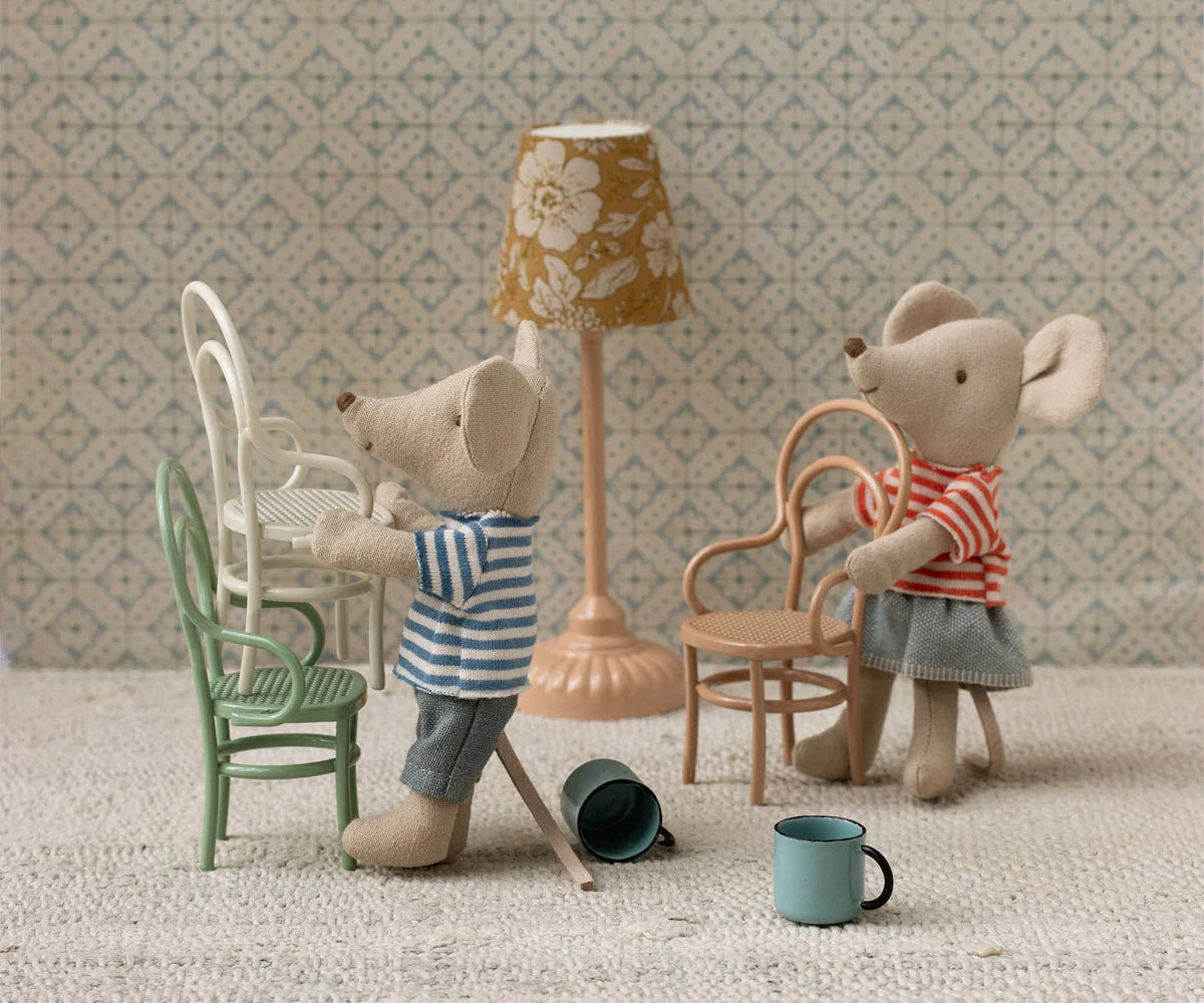 Two Maileg Vintage Chairs (Dark Powder) provide charming seating for toy mice or a unique dollhouse accent, complete with mugs and a lamp set against patterned wallpaper.