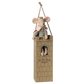 A Maileg King Mouse, Dad, dressed regally, sits in a cardboard castle tower with "Let the story begin" written on it and hangs by a string.