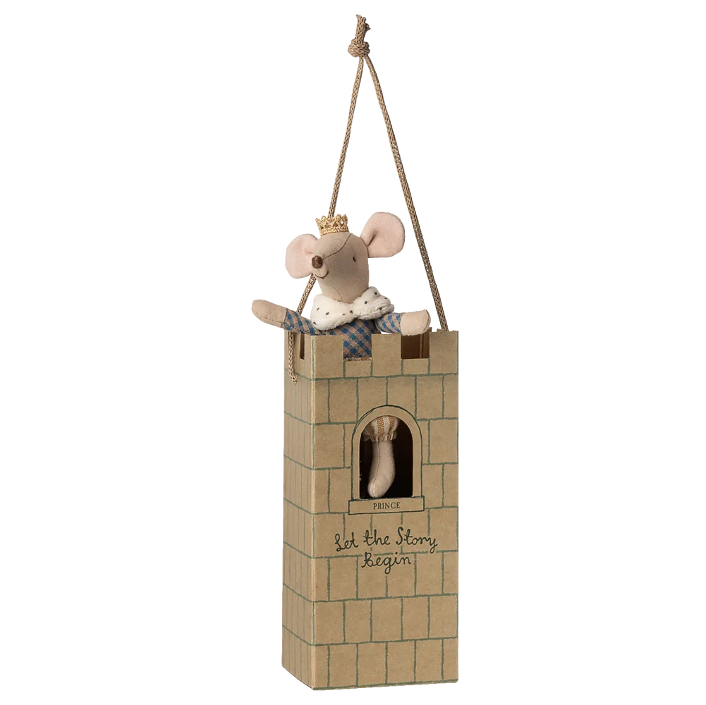 The Maileg Prince Mouse, Big Brother - Ocher, dressed regally, sits atop a cardboard castle tower with a rope handle and "Let the Story Begin" inscribed on the front.