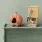 Maileg’s Pumpkin Carriage - Mouse, paired with a fabric castle play set and complete with a plush mouse, ladder, and stacked mattresses, displayed on a green wooden surface against a light green wall.