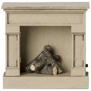 A compact, off white wooden fireplace model by Maileg, featuring decorative logs inside, perfect for adding a vintage touch to your miniature home.