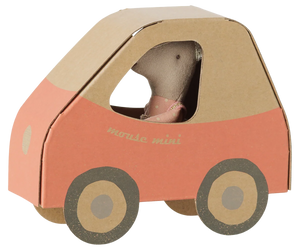 A Maileg Driver Mouse, Little Sister sits inside a charming car with red sides and large round wheels.
