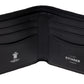 Open the black leather Capra Billfold 6 Credit Card Wallet by Ettinger, featuring multiple card slots, an embossed logo, and "Ettinger London" text on the right side. This classic wallet is crafted from premium goat leather for a luxurious touch.