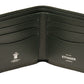Open the Capra Billfold 6 Credit Card Wallet by Ettinger, crafted from luxurious dark green goat leather with multiple card slots and "Ettinger London" inscribed inside.