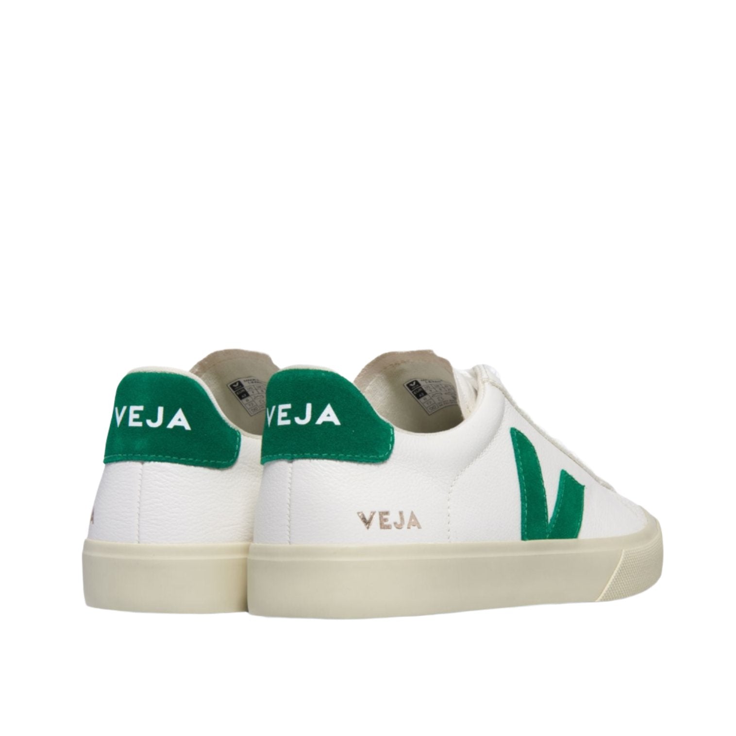 A pair of VEJA Campo Leather Womens Sneakers in white with green accents, crafted in Brazil, featuring "VEJA" text on the heel and a green "V" logo on the side.