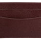 The Ettinger Capra Flat Credit Card Case is a brown textured leather cardholder from the Capra Collection, featuring two card slots with red stitching that highlight its premium goat leather craftsmanship.