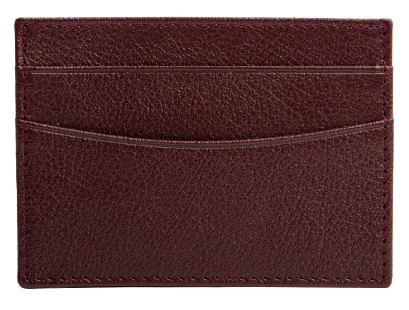 The Ettinger Capra Flat Credit Card Case is a brown textured leather cardholder from the Capra Collection, featuring two card slots with red stitching that highlight its premium goat leather craftsmanship.