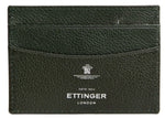 A sophisticated dark green goat leather cardholder, known as the Ettinger Capra Flat Credit Card Case, features the brand name "Ettinger" embossed in white on the front.