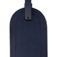 Ettinger's Capra Luggage Tag with Security Flap, from the Capra Collection, is rectangular with a rounded top in dark blue goat leather and includes a strap with a buckle for easy attachment.