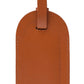 This Capra Luggage Tag with Security Flap by Ettinger is crafted from brown goat leather and features a sturdy strap, combining durability with elegance.