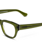 The Miklos Readers by Caddis are ideal for larger faces, featuring thick olive green frames and clear lenses. Stylish white text on the temples adds a touch of fashion to this functional eyewear.