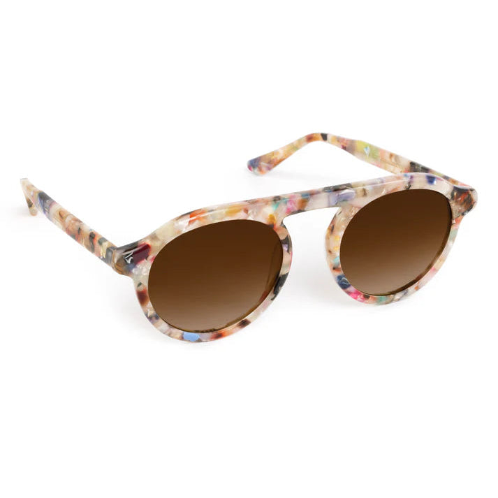 The Krewe Cameron Sunglasses feature multicolored marbled acetate round frames and brown gradient lenses, shown on a white background.