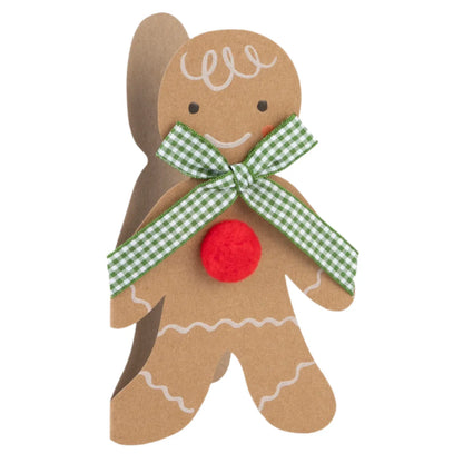 The Meri Meri Gingerbread Man Card, featuring icing details, a green gingham ribbon bow, and a red pom-pom on its chest, beautifully captures the essence of a charming Christmas card.