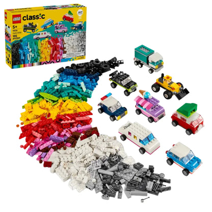 The LEGO® Classic Creative Vehicles set by Legos - Toyhouse offers a vibrant assortment of colored bricks and customizable LEGO vehicles. The open box in the background showcases the contents and potential creations, making it a versatile building toy for endless imaginative play.