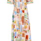 The Casey Dress by Hunter Bell NYC is a knee-length sheath midi with short puff sleeves, showcasing a colorful abstract geometric and food-themed pattern on a light background.