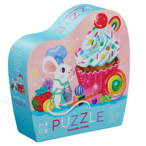 This vibrant Crocodile Creek Celebration! 12 Piece Mini Puzzle, designed for children aged 2 and up, showcases a whimsical mouse sporting a chef hat amidst delightful cupcake and lollipop motifs, making it an ideal jigsaw puzzle for young kids.