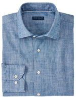 A folded light blue men's cotton sport shirt with a tailored fit, featuring long sleeves and a label inside the collar reading "Peter Millar Japanese Selvedge Sport Shirt" by Peter Millar.