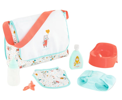 The Corolle Baby Doll Changing Bag + Accessories, from the Corolle brand, offers a child's play diaper bag set including a toy bottle, bib, pacifier, baby wipes, lotion, potty, and a vibrant changing bag with an adorable cartoon design. Ideal for enriching baby doll playtime!