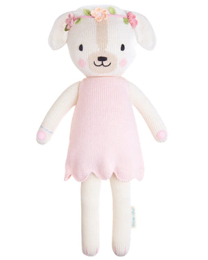 Charlotte the Dog - Regular 20" by Cuddle + Kind is a plush doll in a pink dress with wildflower embroidery and pastel colors—a perfect CharlotteBirthday gift that helps give 1 million meals.