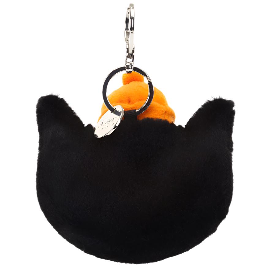 This Jellycat Bag Charm by Jellycat is a black plush cat-shaped keychain featuring soft textured fur, silver hardware, and an orange accent.