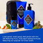 Three blue Jack Black Clean and Cool Body Basics Set products and a black pouch are arranged with leaves, an orange slice, and peppercorns on a table. Text below highlights the set’s best-selling formulas for daily body care.