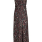The Clem Dress by Proenza Schouler White Label is a sleeveless, full-length style crafted from printed soft twill. Featuring a black base with an abstract red, turquoise, and white pattern, the dress is designed with a fitted waist and subtle ruching at the chest.