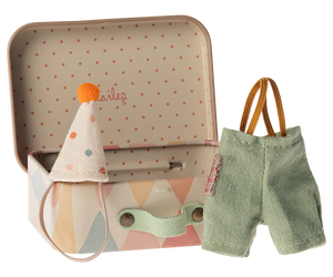 The Maileg Clown Clothes in Suitcase for Little Brother Mouse includes a tiny metal case displaying a party hat with an orange pom-pom and green suspender shorts, perfectly sized for your little mouse.