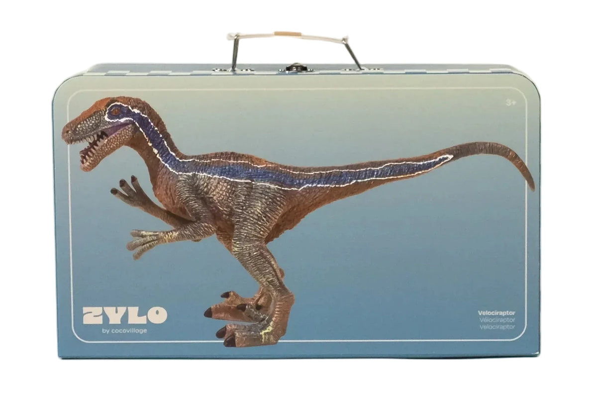 A Velociraptor Dinosaur in a Collectible Box from Coco Village is showcased on the front of a rectangular package featuring a convenient top handle, making it an ideal addition to any dinosaur figures collection for endless prehistoric adventures.