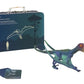 The Coco Village Pterosauria Dinosaur in a Collectible Box is showcased in front of a blue suitcase adorned with pterosaur artwork, inviting you to embark on prehistoric adventures. A small booklet is included alongside the set, making it an ideal addition to any dinosaur figures collectible series.