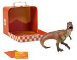The Coco Village Giganotosaurus Dinosaur from the collectible series stands in front of its open orange box, featuring a handle, checkerboard pattern, and mountain design, alongside two orange cards—ready to inspire endless prehistoric adventures.