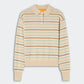 The Collegiate Stripe Polo by Guest in Residence is a women's long-sleeve cashmere sweater featuring horizontal beige, light blue, and light brown stripes, a classic collar, and a three-button placket.