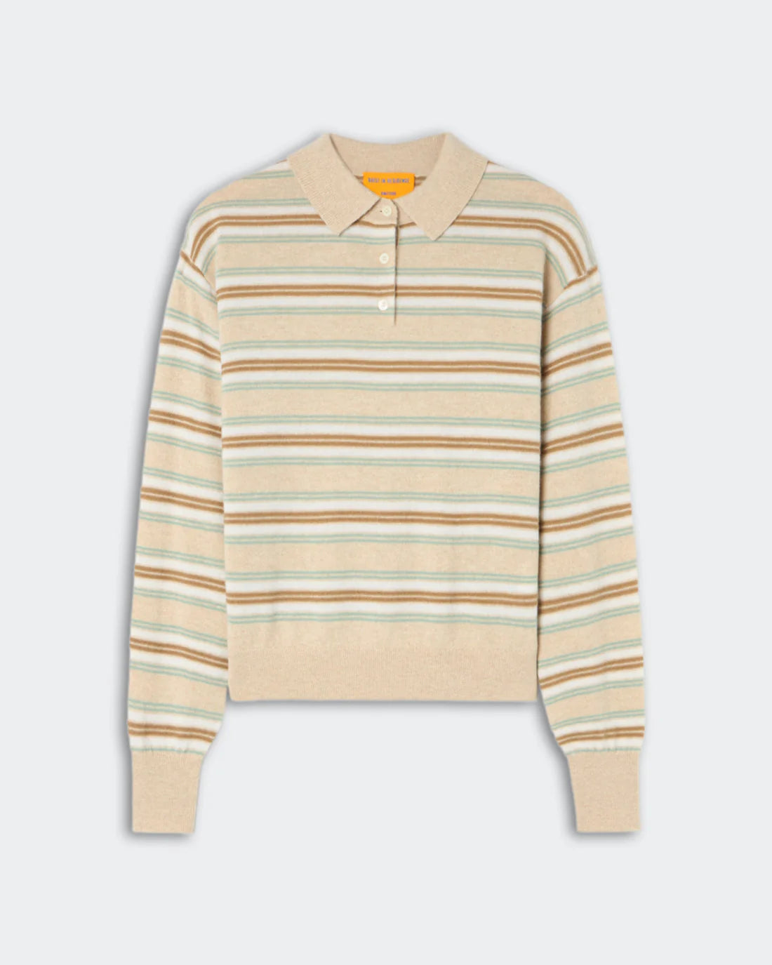 The Collegiate Stripe Polo by Guest in Residence is a women's long-sleeve cashmere sweater featuring horizontal beige, light blue, and light brown stripes, a classic collar, and a three-button placket.