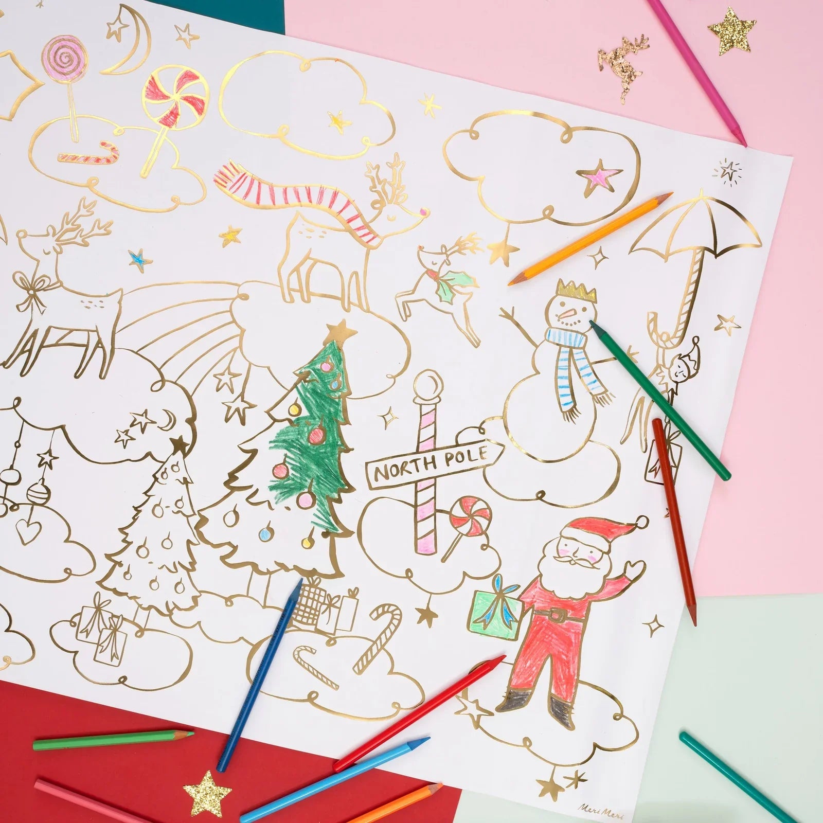 The Meri Meri Christmas Coloring Posters, brought to you by the brand Meri Meri, feature holiday-themed drawings such as Santa, a snowman, reindeer, and a Christmas tree. They are perfect for the little artist in your life to bring to life with an assortment of colored pencils.