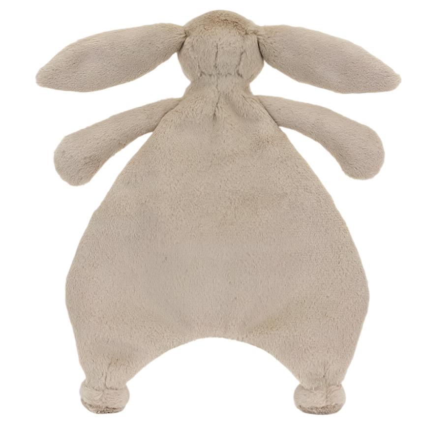 The Jellycat Bashful Beige Bunny Comforter, by Jellycat, is a plush comforter made from recycled fibers, featuring a rabbit-shaped design with long ears and limbs, shown from the back.