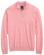 The Johnnie-O Desmond Quarter Zip, a cotton-heavy blend from Johnnie-O, is a pink sweater with plaited knits and ribbed collar, cuffs, and hem. Ideal for any season, this pullover combines style and comfort year-round.