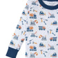 The Kissy Kissy Construction Crew Printed Pajama Set by Kissy Kissy showcases a fun design with cranes, dump trucks, and excavators. Crafted from soft Pima cotton, this children's long-sleeve set features a blue collar and cuffs for added comfort.