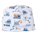 The Kissy Kissy Construction Crew Printed Hat from Kissy Kissy is crafted from white Pima cotton and showcases a lively print featuring colorful excavators, cranes, and hammers.