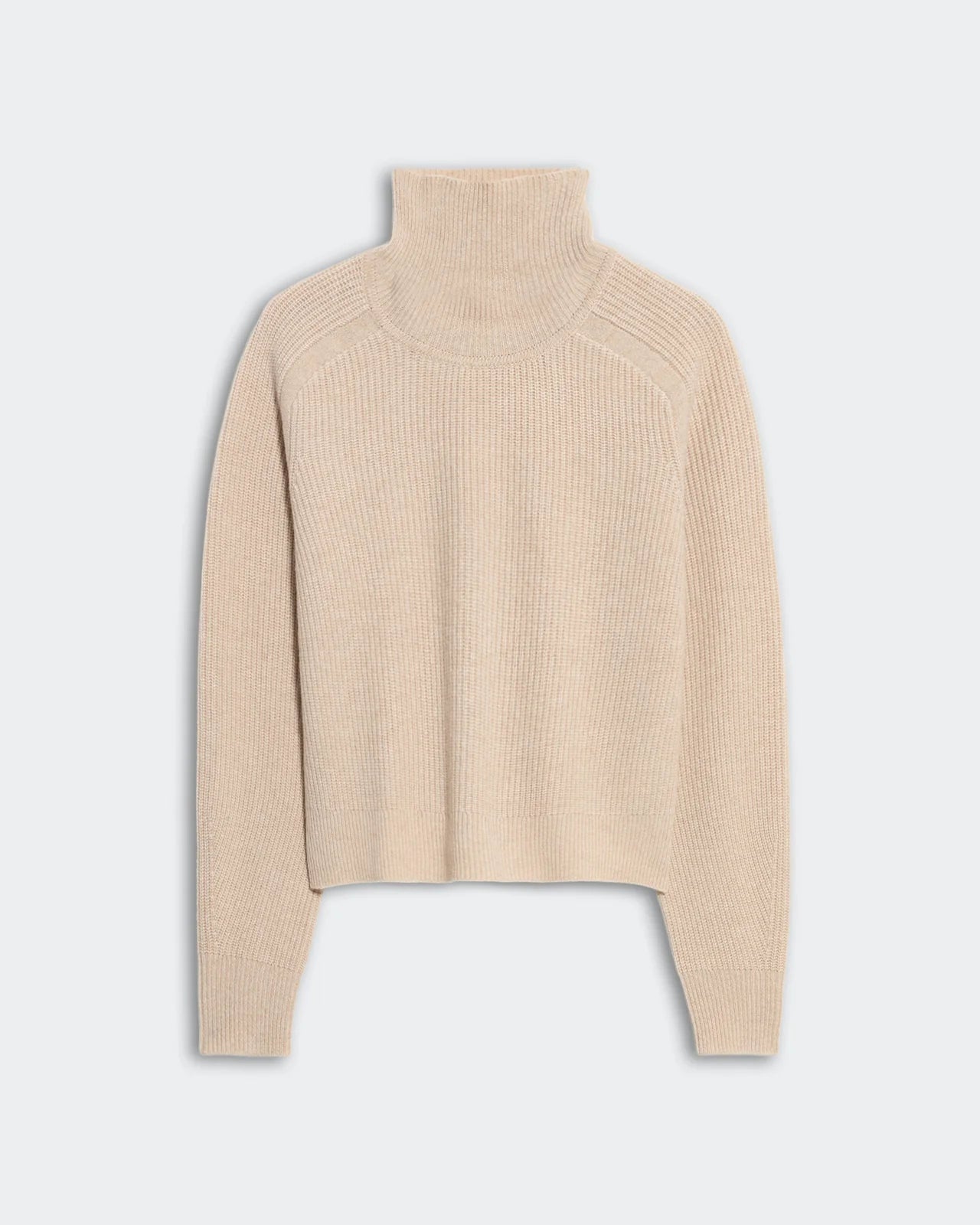 Guest in Residence Cropped Ribbed Turtleneck in beige cashmere, featuring long sleeves and a ribbed knit, displayed flat on a light background.