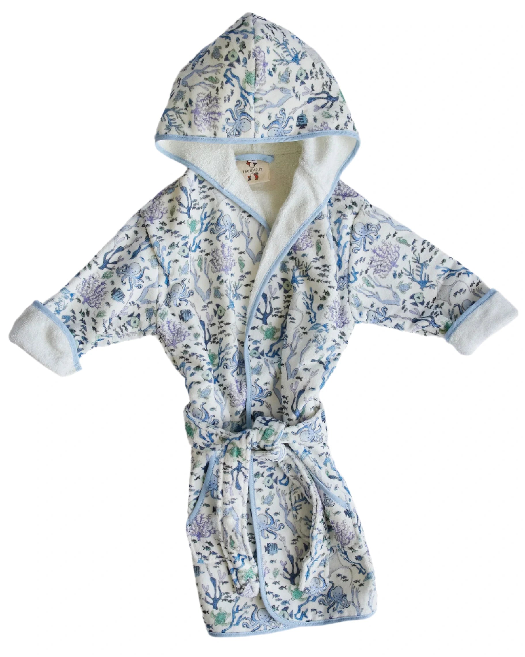 The Timo & Violet Kids' Bathrobe is an ultra-soft velour cotton terry robe with blue trim and a Coral Reef print, shown flat with sleeves and belt extended.