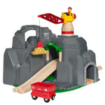 Discover the delight of playful functionality and design with the BRIO World Crane & Mountain Tunnel by Brio. This toy train playset showcases a gray rocky mountain motif, featuring a multistory railway passage. It includes a red crane operated by a yellow figure at the top and a vibrant red cart nestled at the bottom.