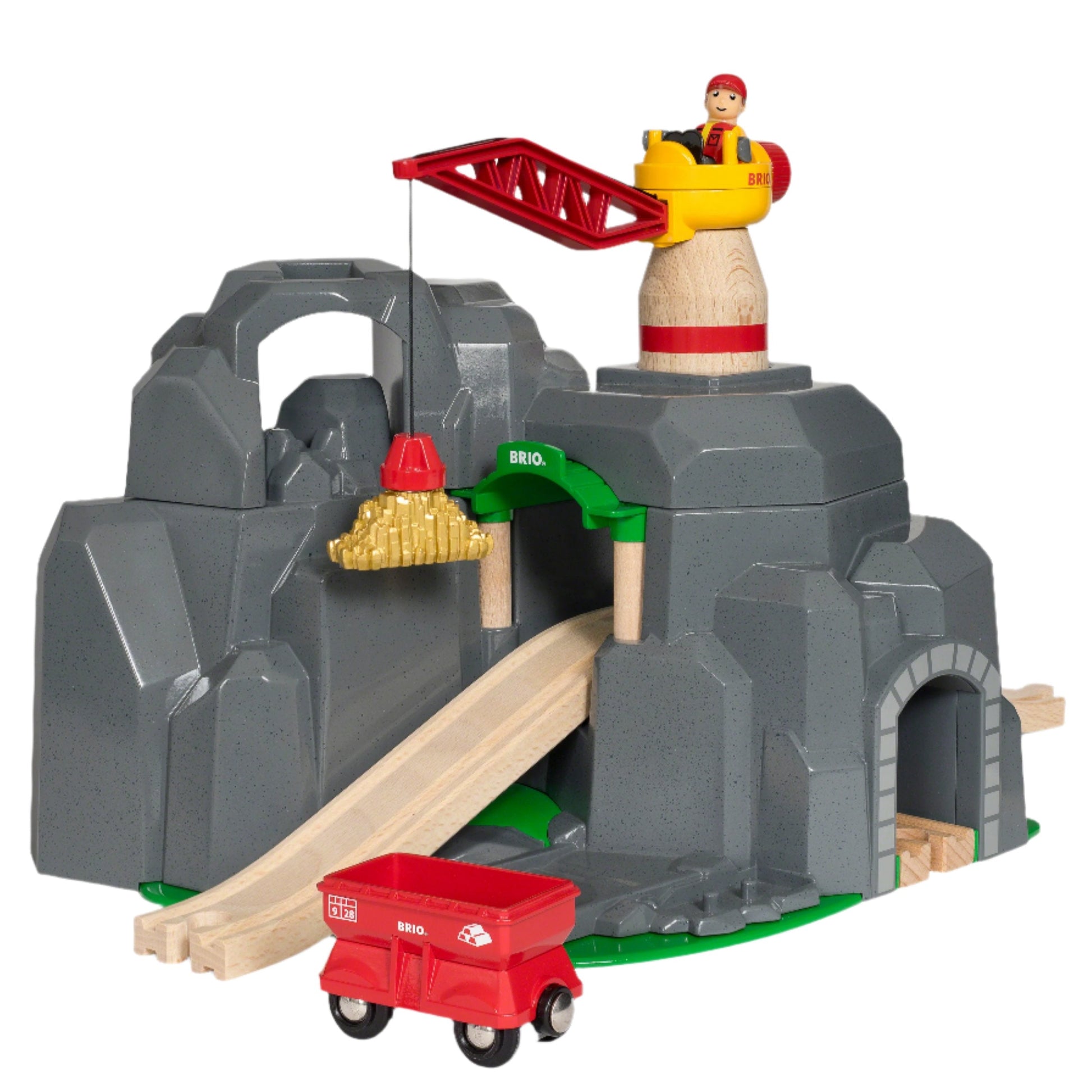 Discover the delight of playful functionality and design with the BRIO World Crane & Mountain Tunnel by Brio. This toy train playset showcases a gray rocky mountain motif, featuring a multistory railway passage. It includes a red crane operated by a yellow figure at the top and a vibrant red cart nestled at the bottom.