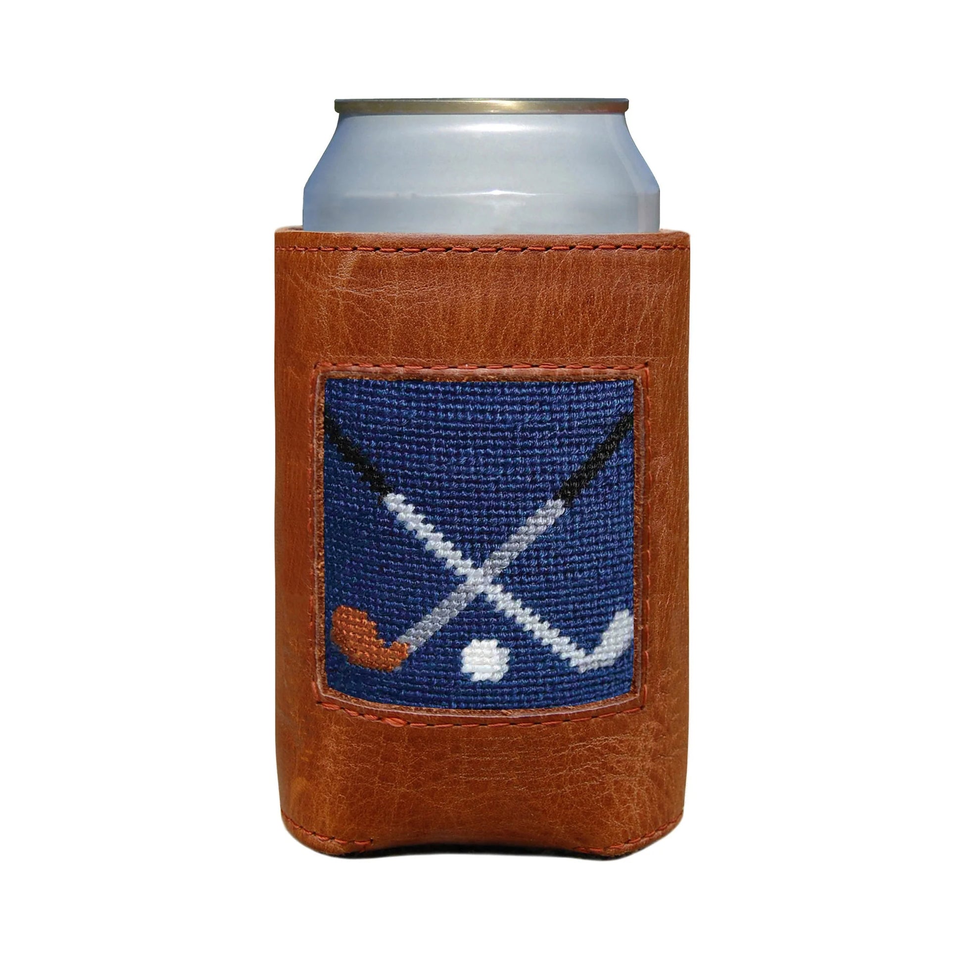 A can in the Smathers & Branson Crossed Clubs Can Cooler, a brown Italian leather sleeve featuring a blue patch with crossed clubs and a puck design.