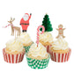 The Meri Meri Festive House Cupcake Kit from Meri Meri offers five delightful holiday-themed cupcakes. Each features white frosting adorned with enchanting decorations, including a reindeer, Santa, Christmas tree, candy cane, and gingerbread person. Nestled in eye-catching red and green striped liners, this kit is the ideal baking gift for the festive season.