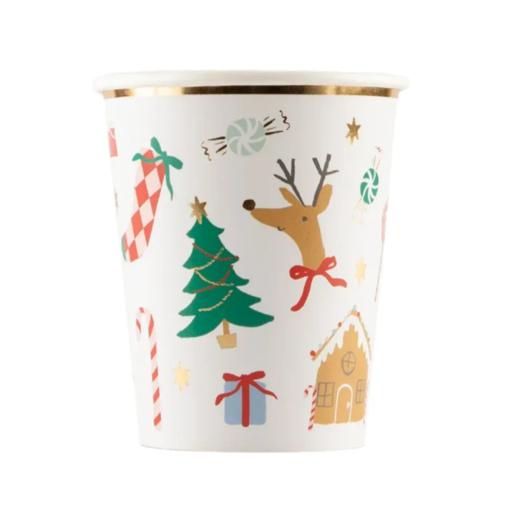 The Meri Meri Jolly Christmas Cups by Meri Meri are festive white paper cups featuring Christmas-themed illustrations, such as a reindeer, Christmas tree, candy cane, and gift box, all highlighted with gold trim at the top edge—ideal for any holiday party.