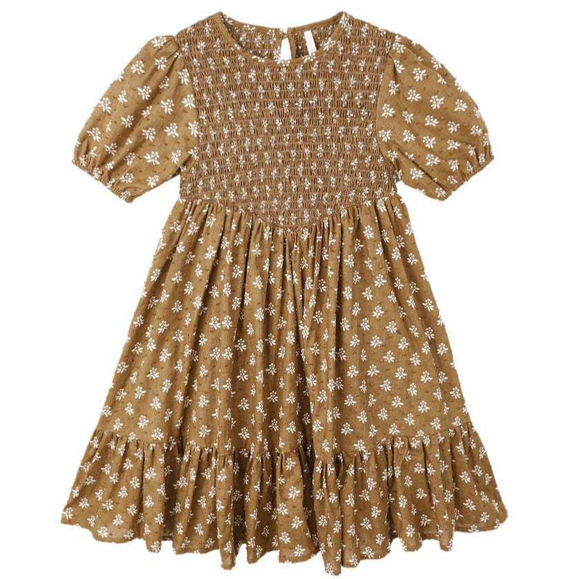 The Girls' Lydia Dress by Rylee & Cru is a brown, short-sleeve dress with a white floral print, shirred bodice, ruffled hem, and gathered skirt—an effortlessly chic smocked style for any occasion.