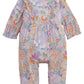 The Baby Girls’ Arabella Ruffle Romper by Magnetic Me features long sleeves, ruffled shoulders, and a pastel floral print—designed for easy diaper changes.
