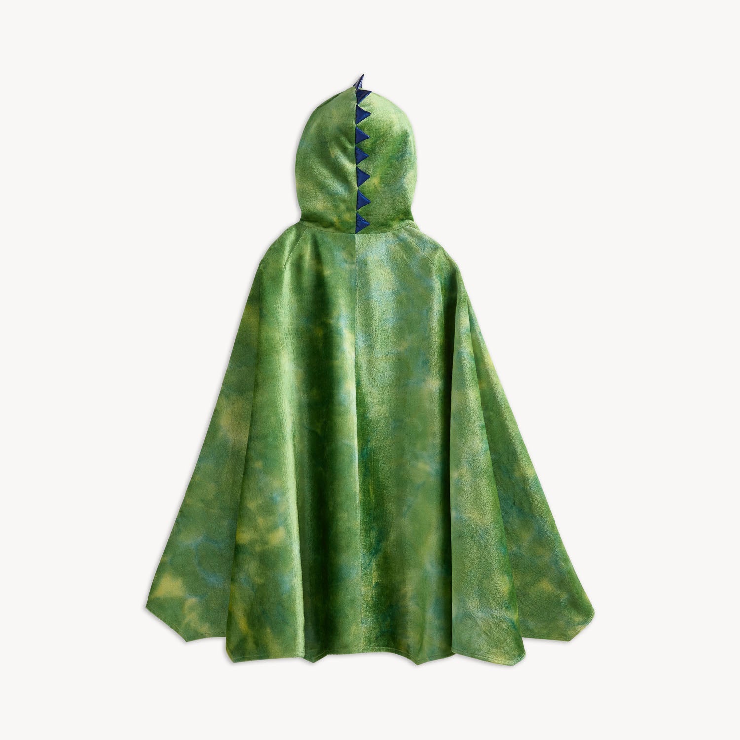 The Dragon’s Tale Velour Cape by Magnetic Me features a green hooded design with a scale-like pattern and triangular spikes running down the hood and back, resembling a dinosaur or dragon—perfect for costumes or imaginative pretend play—displayed against a white background.