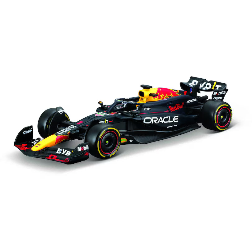Here is the rewritten sentence using your product data: The Maisto R/C 1:41 DC Oracle Red Bull RB2 features striking black and yellow colors with Red Bull, Oracle, and Mobil branding, shown from the side on a white background. This highly detailed Formula 1 model comes as part of an R/C set operating at 2.4GHz, ready to bring all the excitement of the race track into your home.