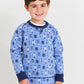 A young boy with brown hair wears a light blue lighthouse shirt and Boys' Sheffield Shorts from The Beaufort Bonnet Company, standing against a white background.